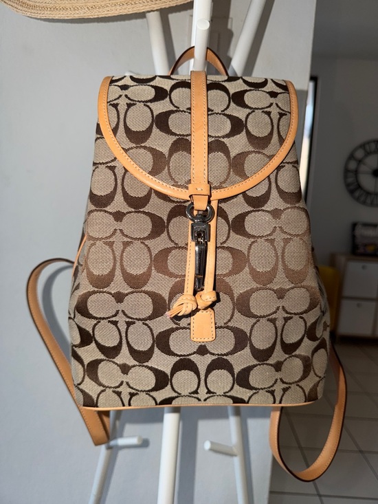 Coach Handbags - Vintage💕like new! Coach Signature Canvas Backpack with Tan Leather Trim